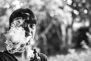woman vaping outside