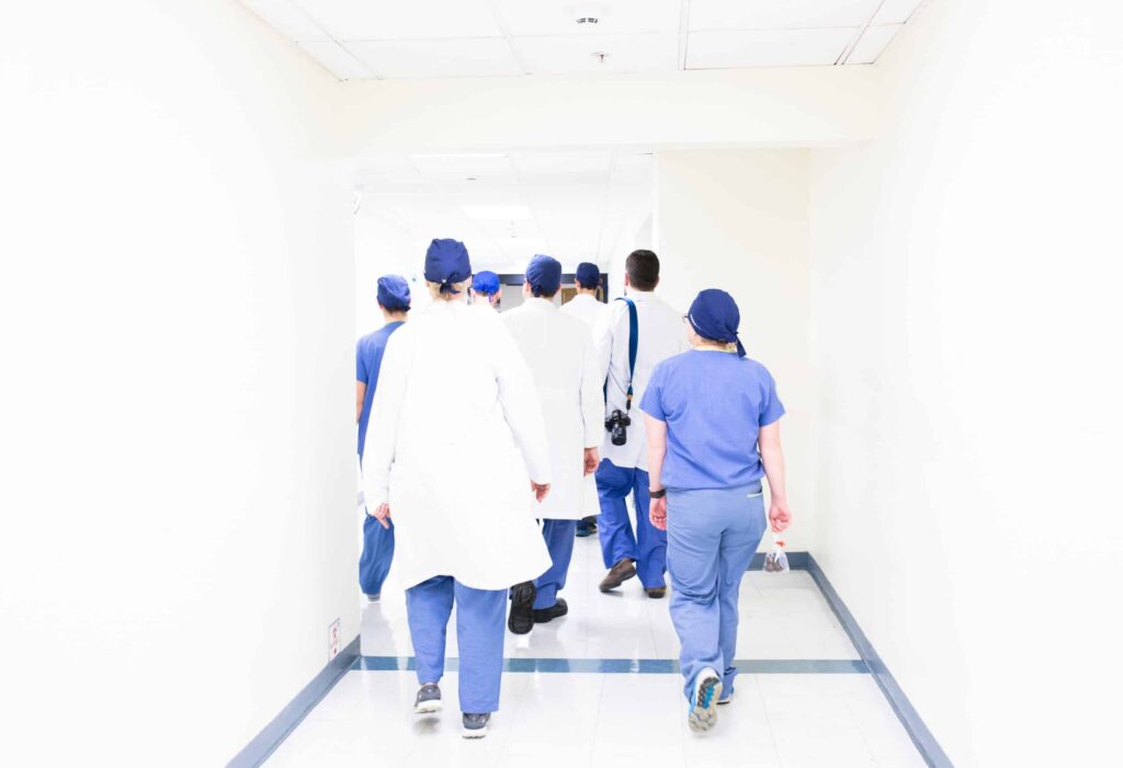 Surgical team of doctors walking in the hallway